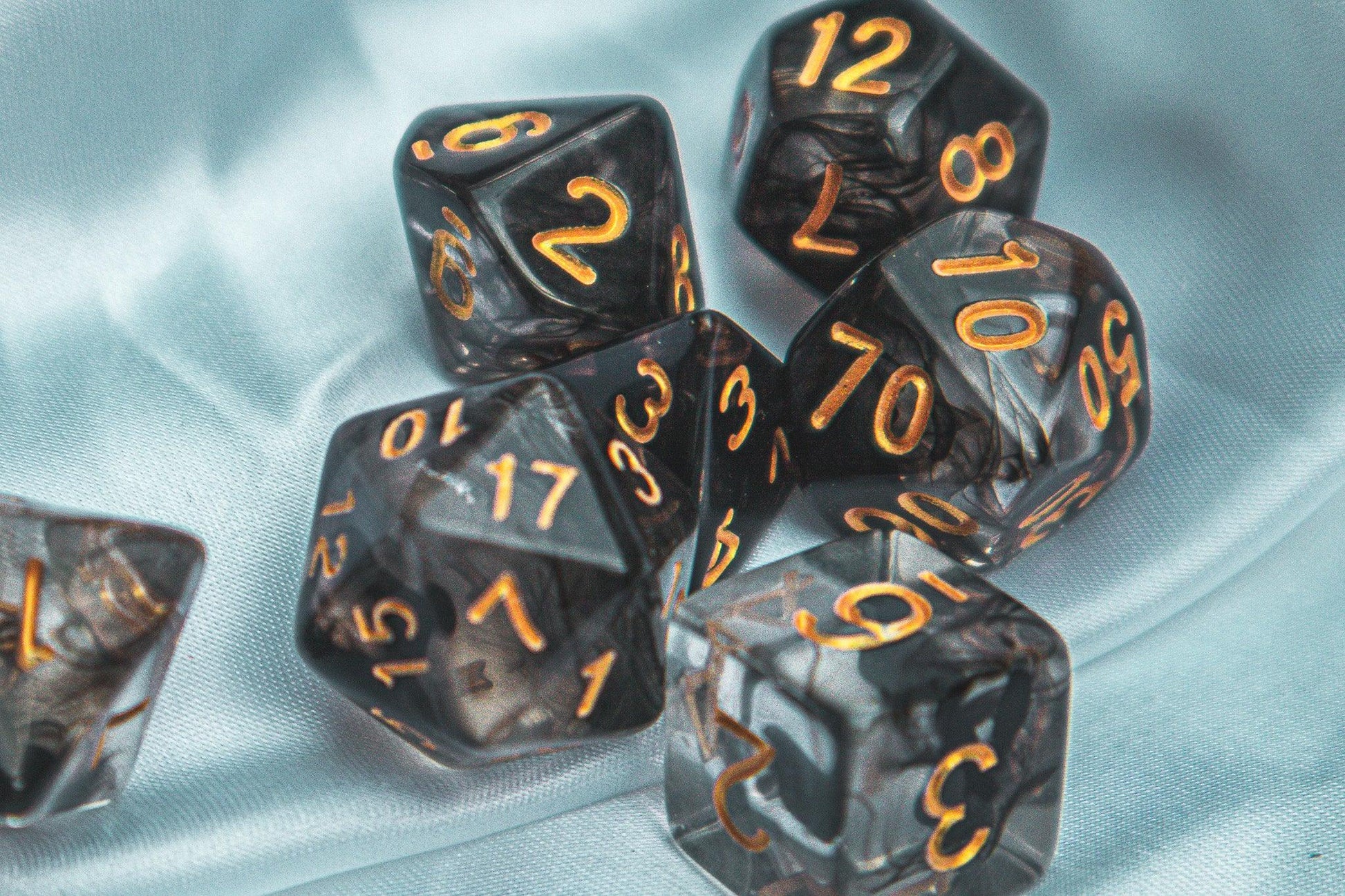 Cursed whispers dice set - The Flaming Feather & Flaming Filament