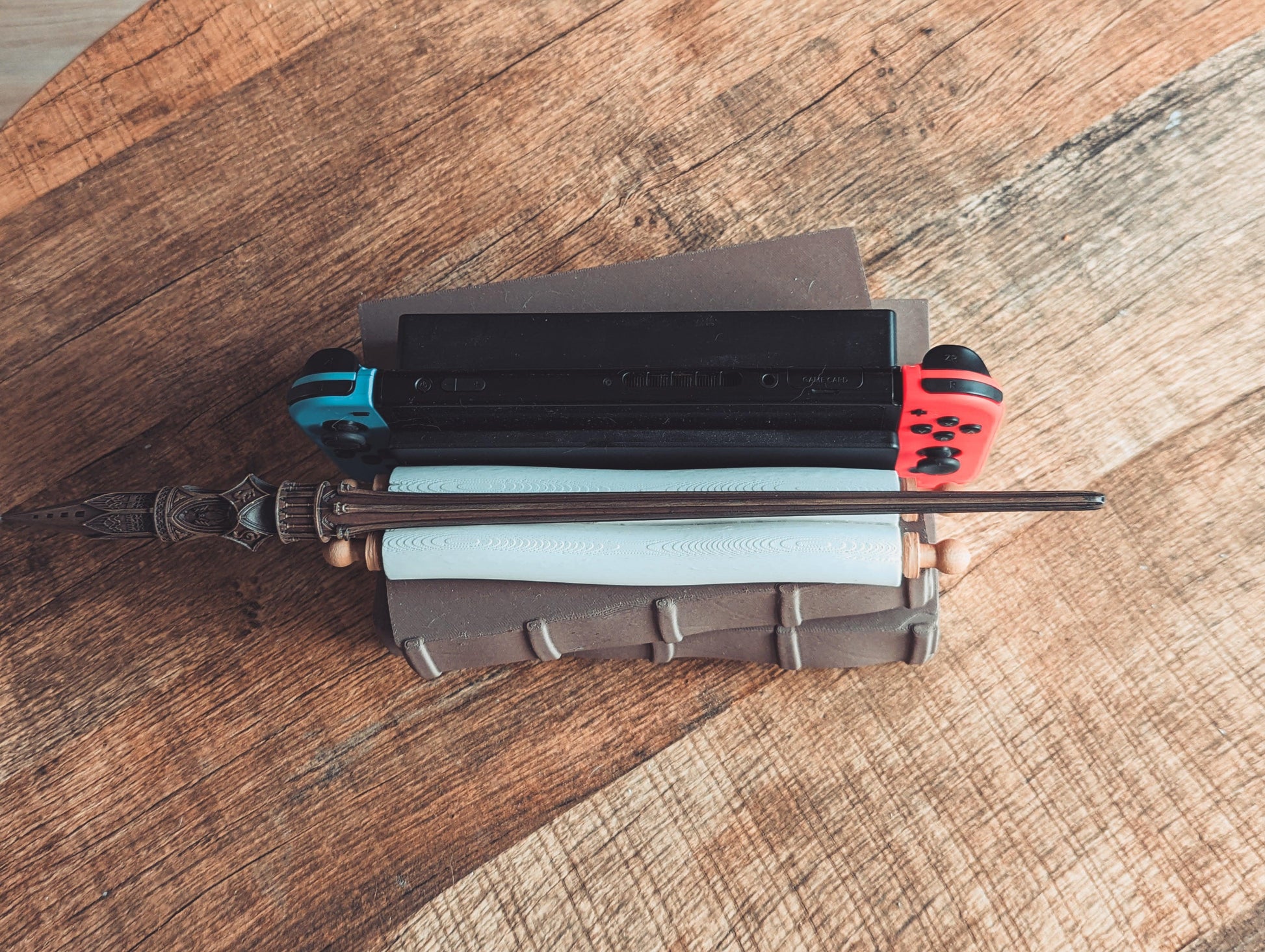 Magical Books Wandholder - Nintendo Switch Dock - The Flaming Feather & Flaming Filament