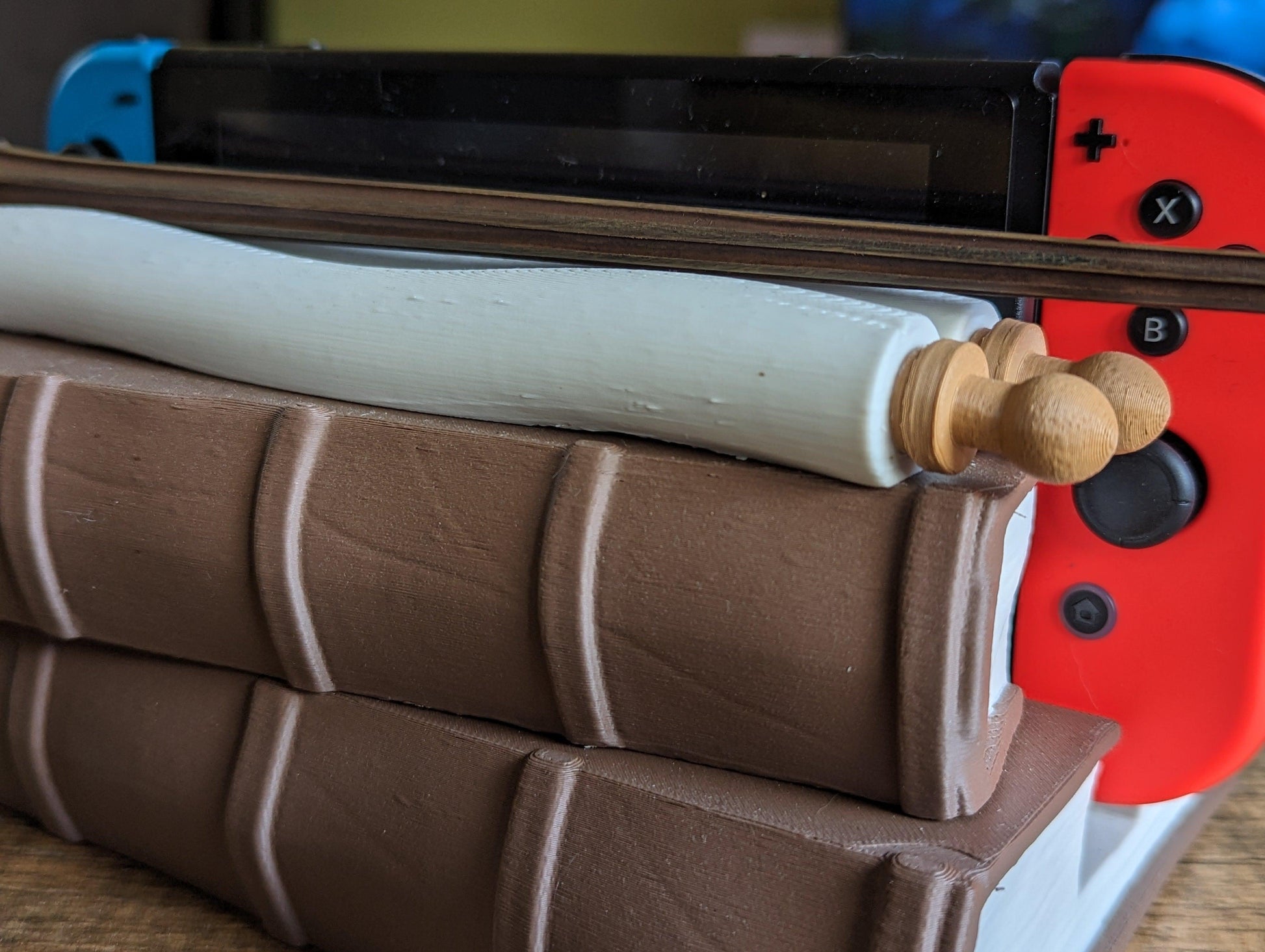 Magical Books Wandholder - Nintendo Switch Dock - The Flaming Feather & Flaming Filament