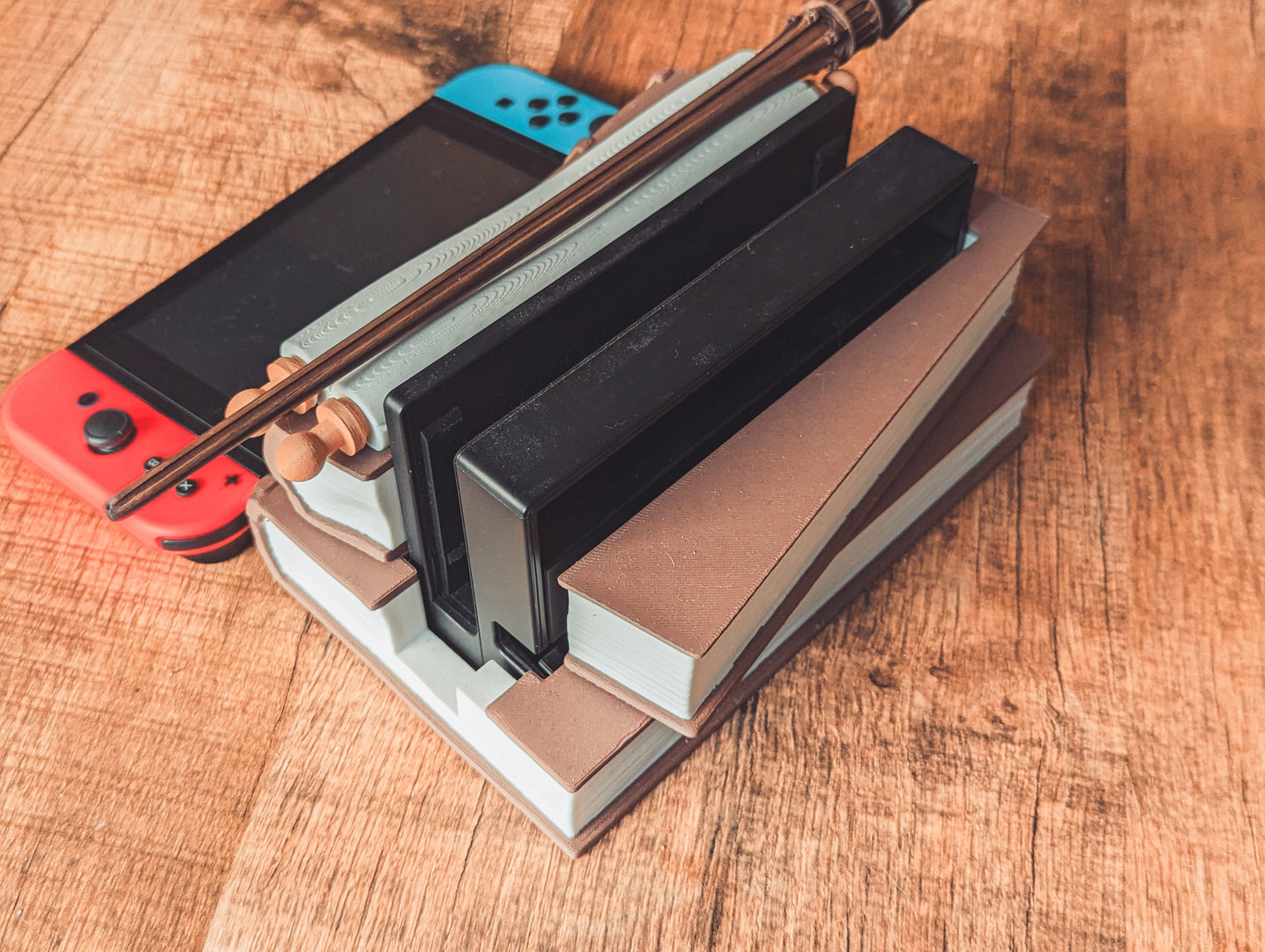 Magical Books Wandholder - Nintendo Switch Dock - The Flaming Feather & Flaming Filament