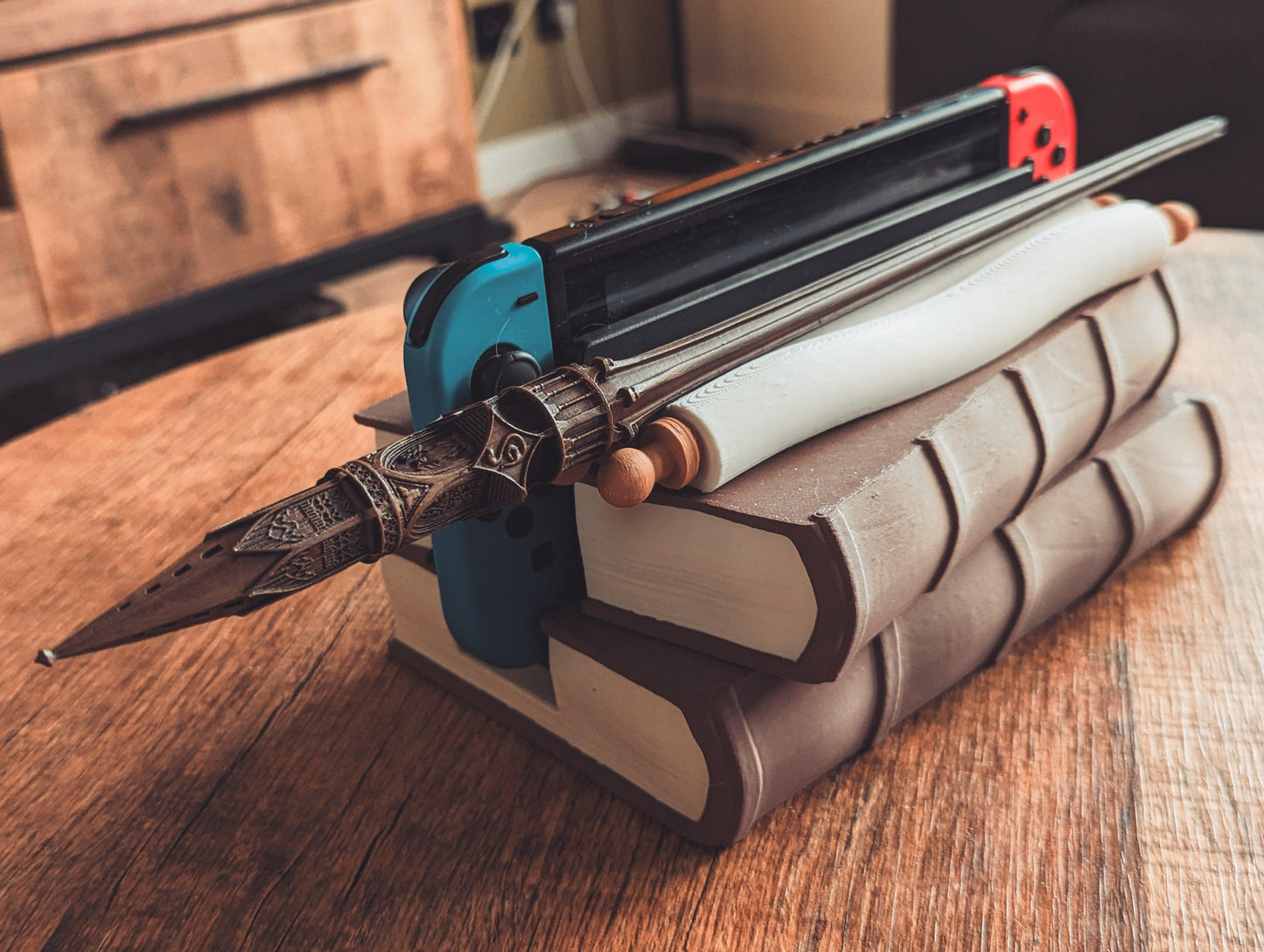 Magical Books Wandholder - Nintendo Switch Dock - The Flaming Feather & Flaming Filament
