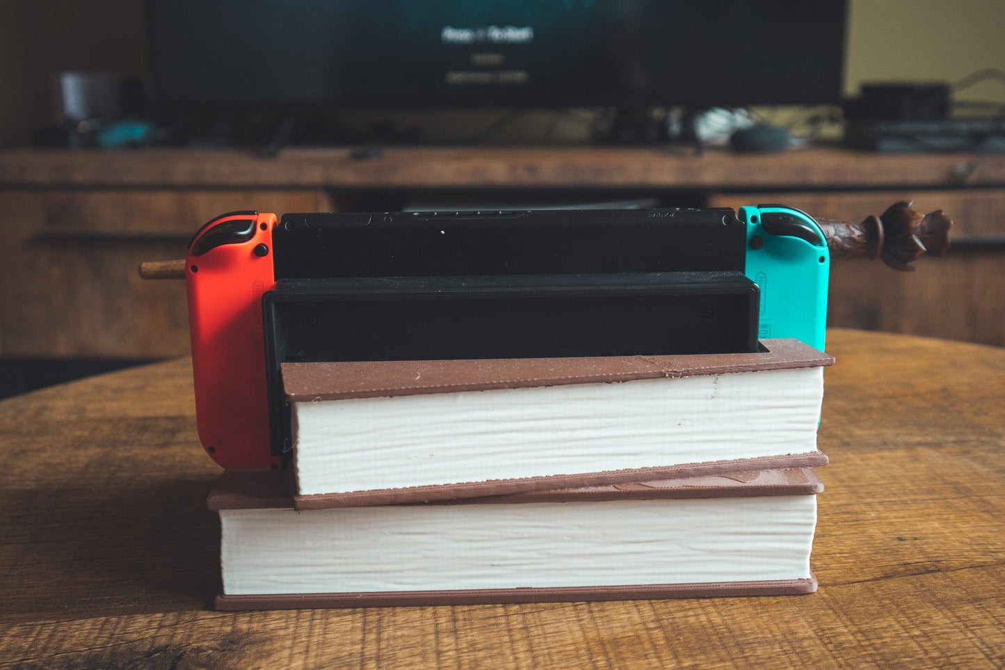 Magical Books Wandholder - Nintendo Switch Dock - The Flaming Feather & Flaming Filament